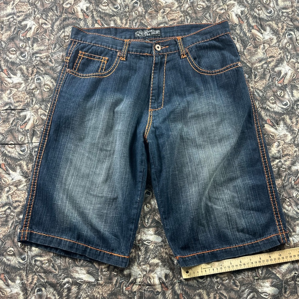 Early 2000s dark washed, orange stitch, baggy denim jeans shorts